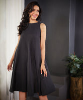 loose fitted sleeveless flouncy linen dress