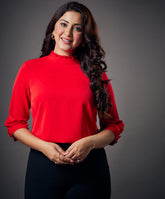 neck and sleeve frilled red top