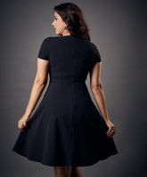 black shank attached black mini dress