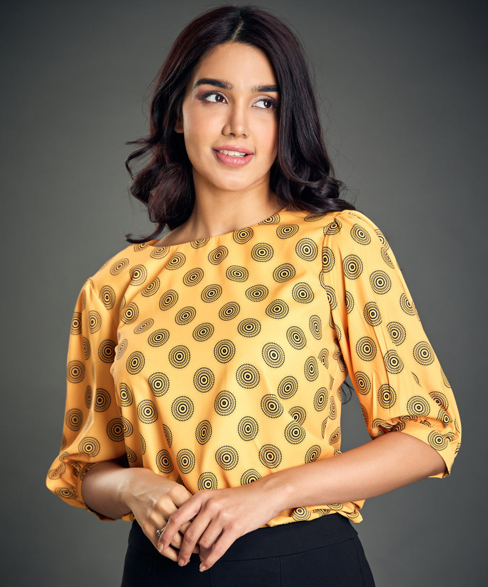 puff sleeve printed orange blouse