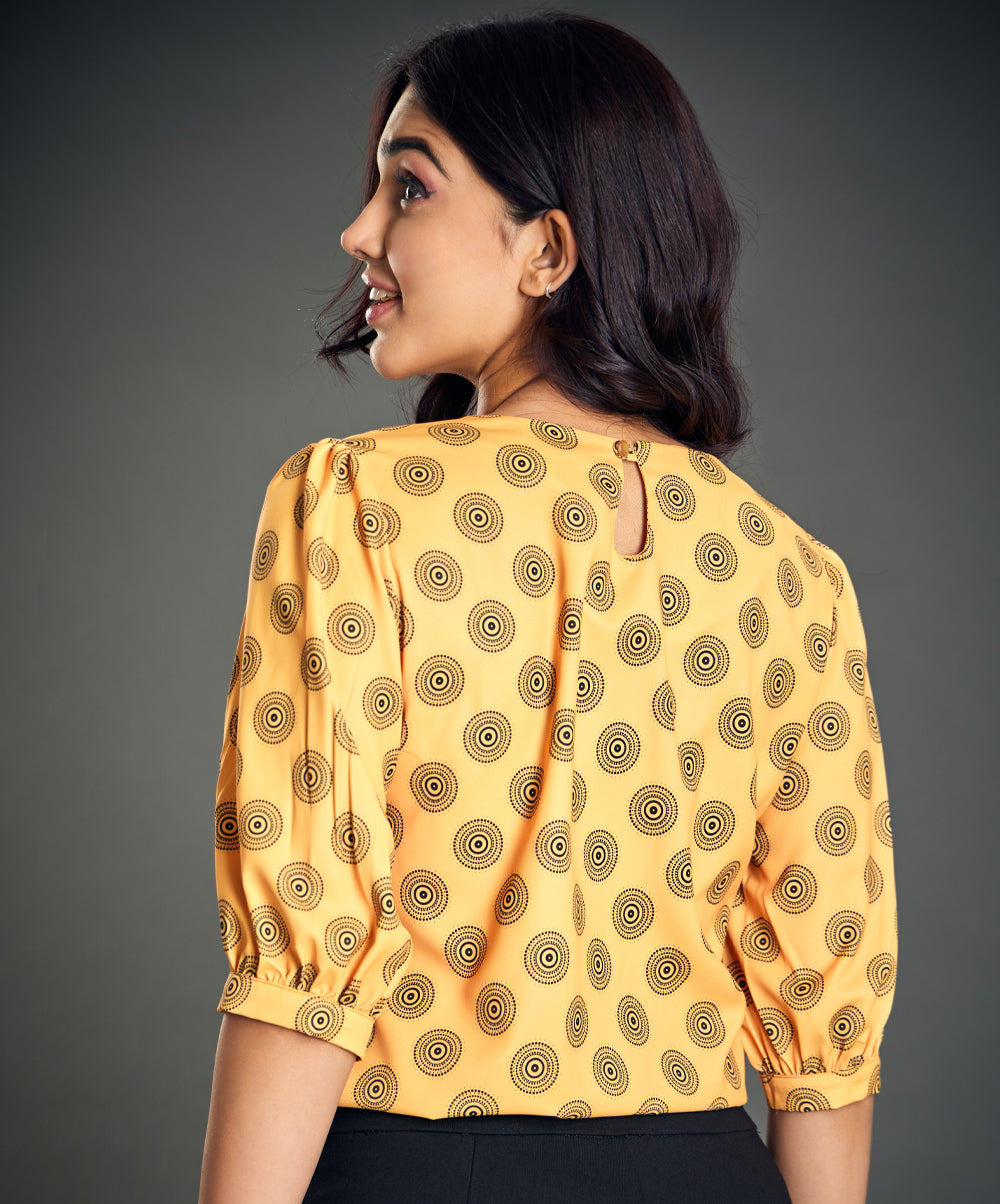 puff sleeve printed orange blouse